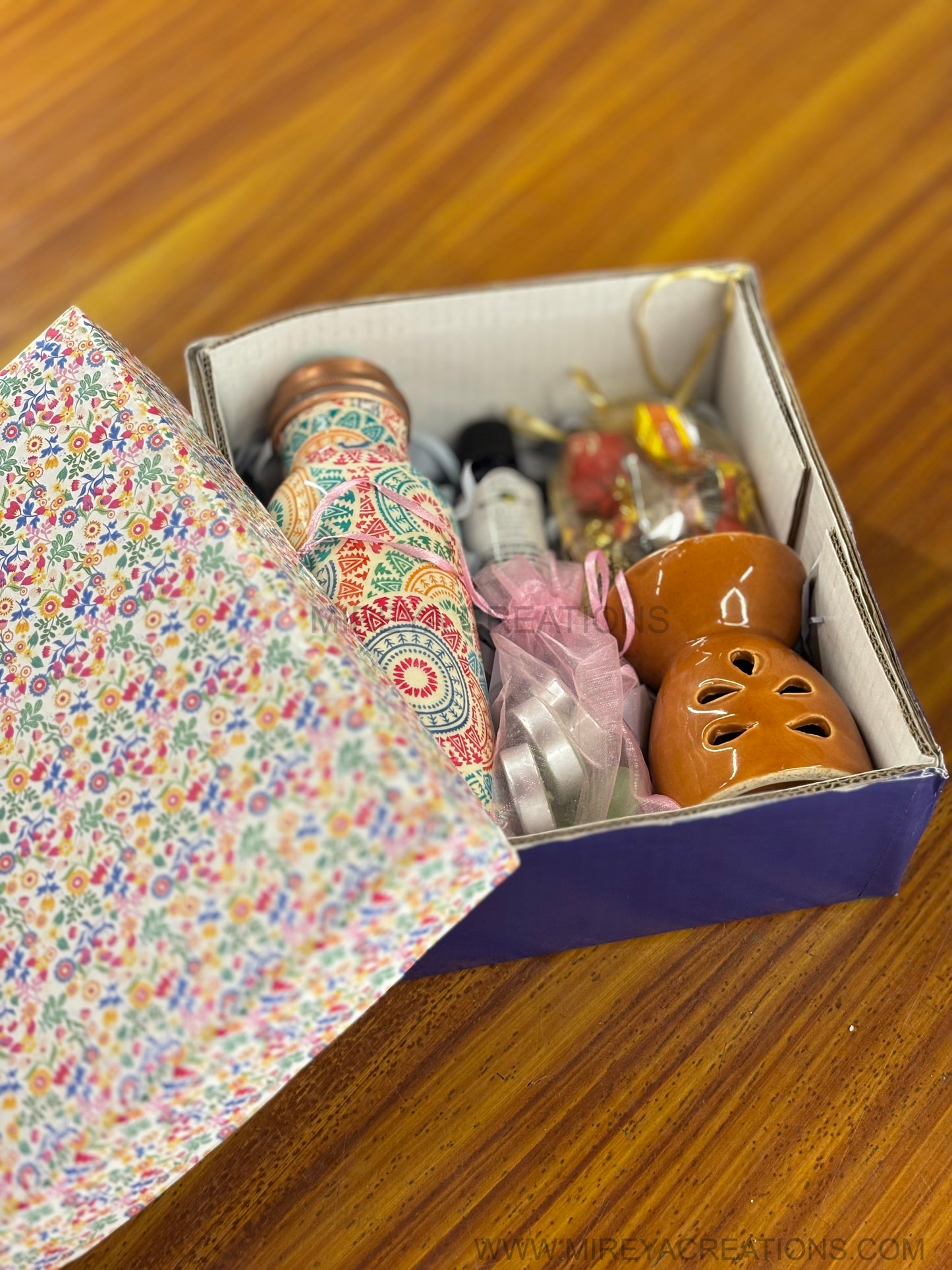 Printed Copper Bottle & Aroma Gift Set Return Gift | Ceramic Burner, Essential Oil, Tea Lights & Chocolates | Wedding & Housewarming Favor Under ₹1500