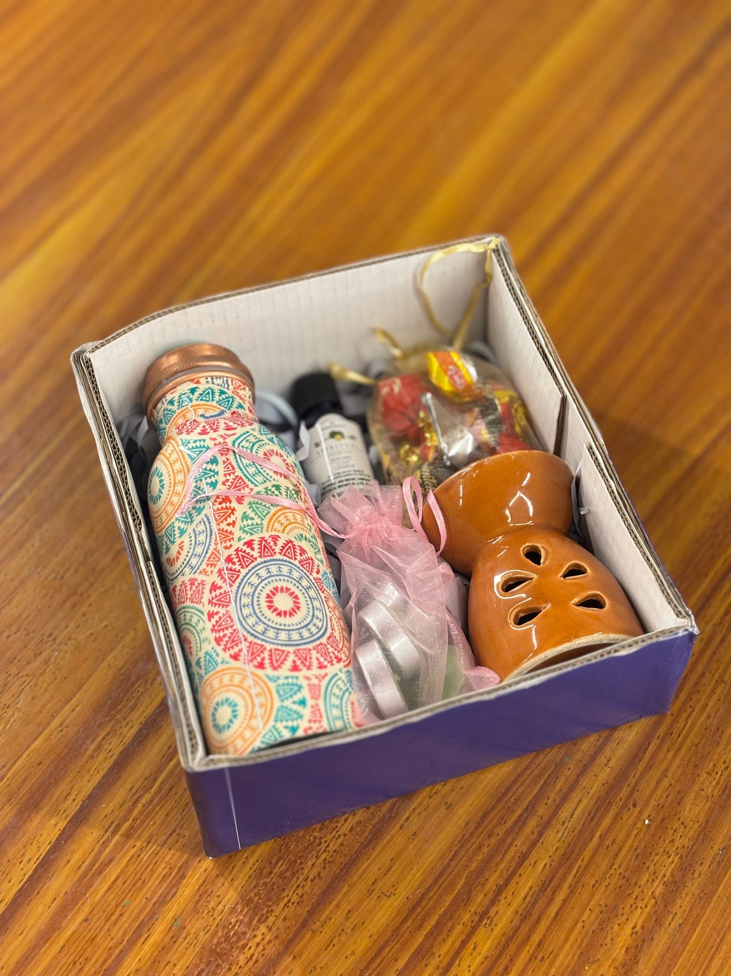 Printed Copper Bottle & Aroma Gift Set Return Gift | Ceramic Burner, Essential Oil, Tea Lights & Chocolates | Wedding & Housewarming Favor Under ₹1400