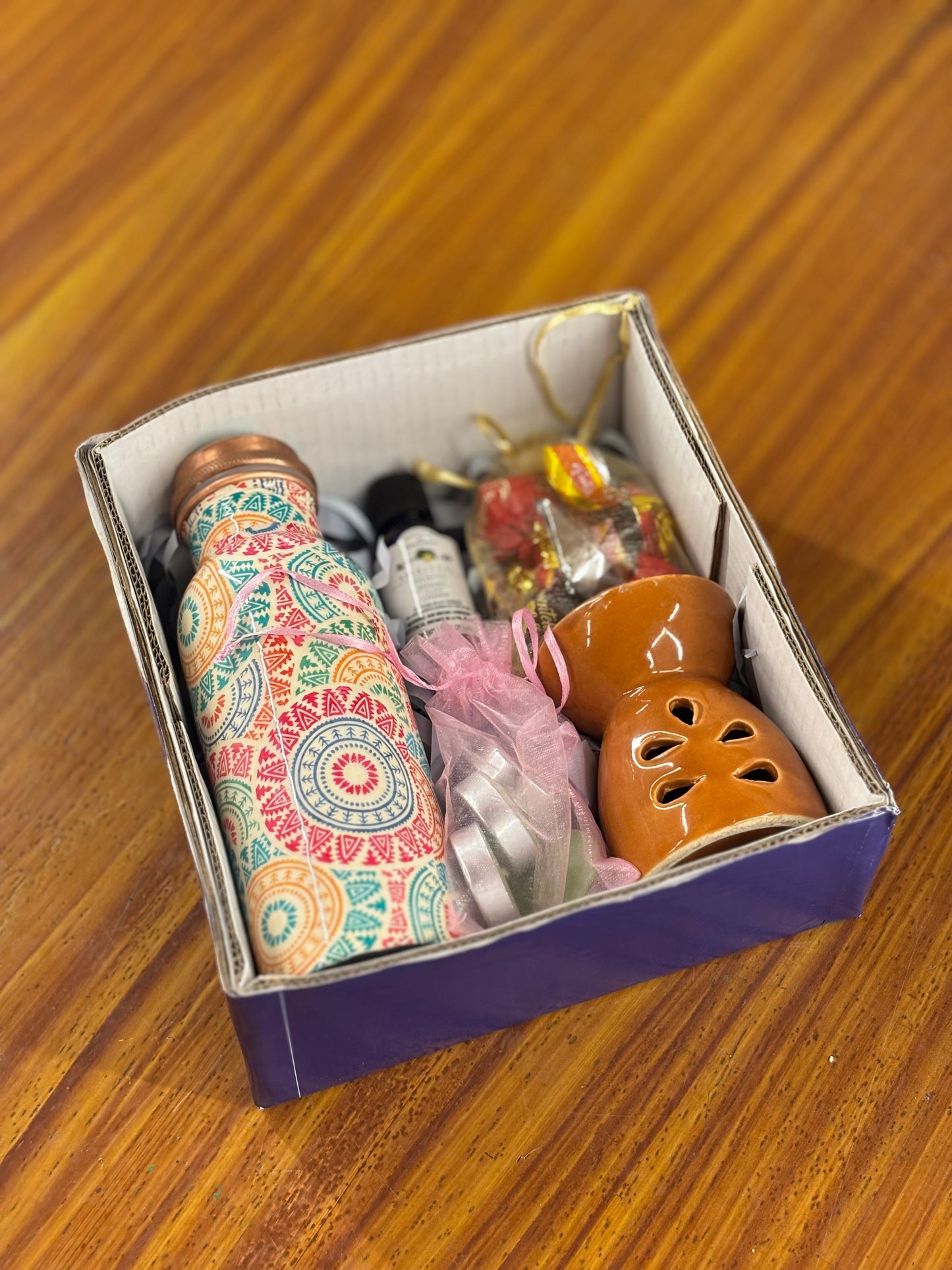 Printed Copper Bottle & Aroma Gift Set Return Gift | Ceramic Burner, Essential Oil, Tea Lights & Chocolates | Wedding & Housewarming Favor Under ₹1400