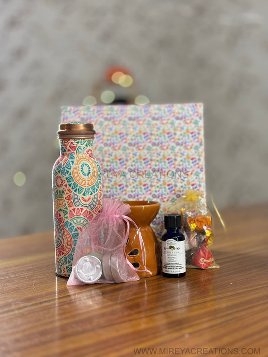 Printed Copper Bottle & Aroma Gift Set Return Gift | Ceramic Burner, Essential Oil, Tea Lights & Chocolates | Wedding & Housewarming Favor Under ₹1500