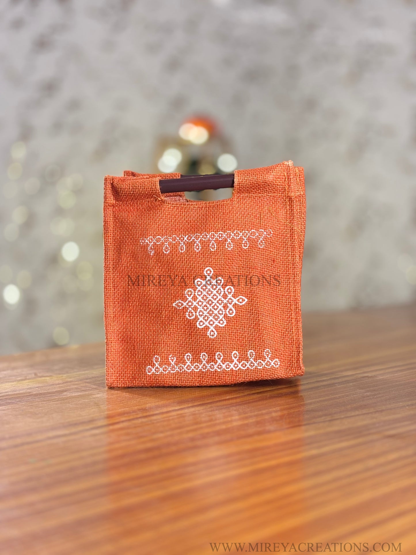 Orange Kolam Jute Bag Return Gift | Handcrafted Jute Bag with Wooden Handle | Wedding & Festive Favor Under ₹100