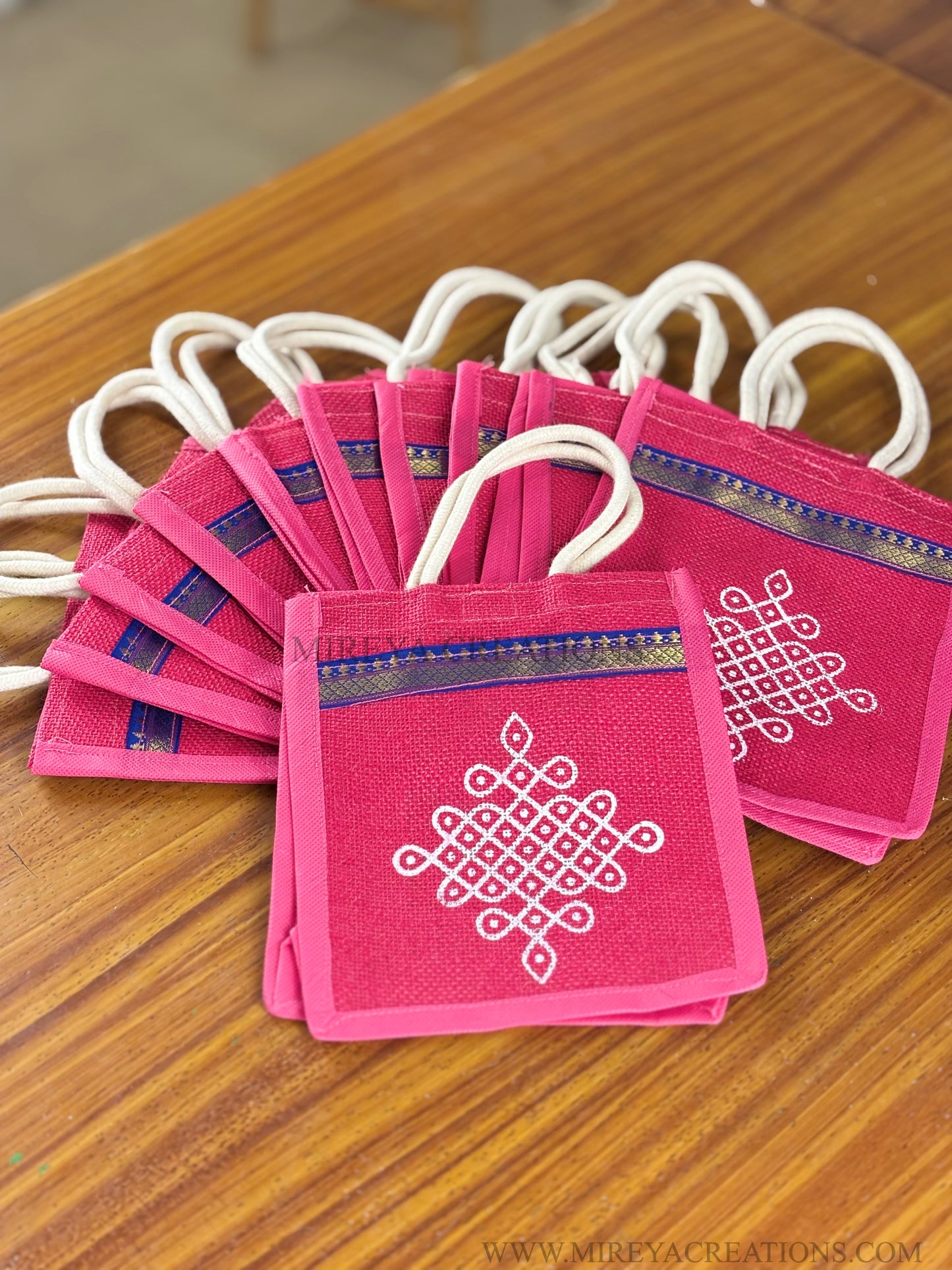 Pink Kolam Print Mini Jute Bag Return Gift | Handcrafted Jute Bag with Blue Zari Border | Wedding & Festive Favor Under ₹150